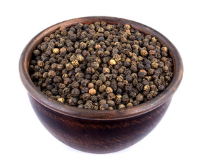 Black pepper in bowl isolated on white background