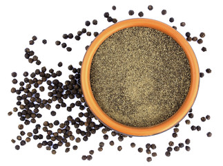 Black pepper in bowl isolated on white background