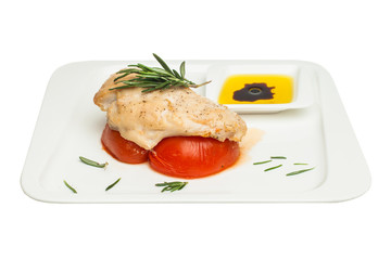 Chicken breast with tomato and rosemary herb isolated on white
