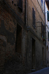 Narrow ancient street of the Italian city