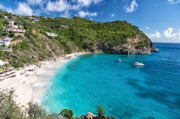 Türaufkleber Harbor with sand beach, blue sea and mountain landscape in gustavia, st.barts. Summer vacation on tropical beach. Recreation, leisure and relax concept. Wanderlust and travel with adventure. © be free