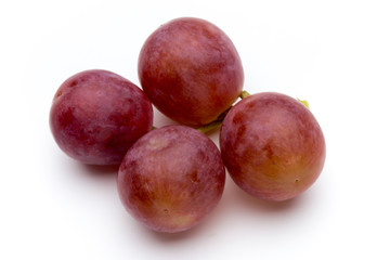 Ripe red grape isolated on white.