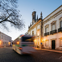 Arco Da Vila at a speeding bus in Faro City, Algarve- Portugal.