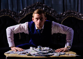 Man, businessman, boss with strict face leaning on table