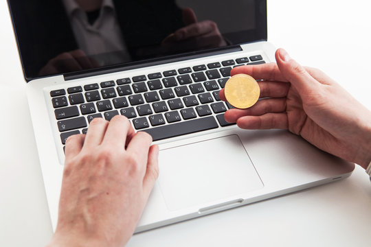 Bitcoin coin symbol on laptop. Crypto currency sign. Future concept financial currency.