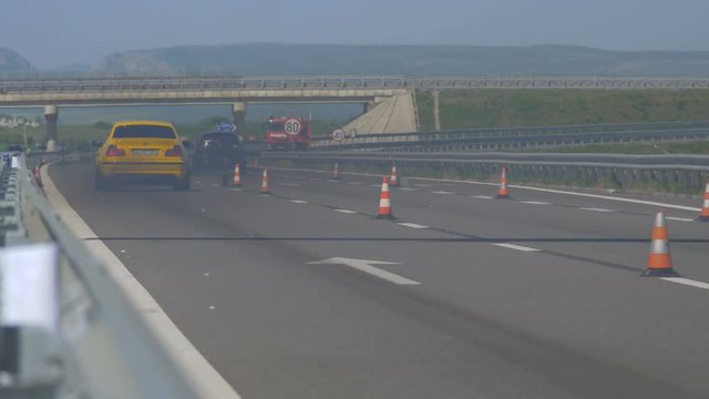 Yellow Car Leaving Smoke Behind