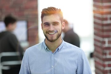 Obraz premium Portrait of confident businessman in office.