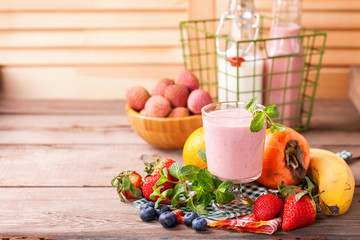 Blueberry smoothie   and fruits. Selective focus. Copy space. Top view