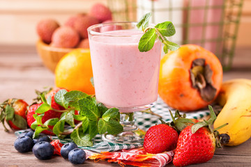 Blueberry smoothie   and fruits. Selective focus. Copy space. Top view