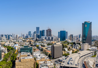 Rooftop view of Tel Aviv center. Old houses and modern skyscrapers.