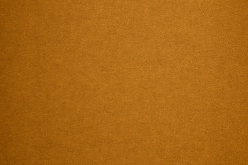 Textured gold artistic grainy background for use in screensavers, wallpapers, for inscriptions and...