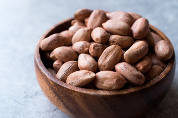 Organic Raw Hazelnuts in Wooden Bowl