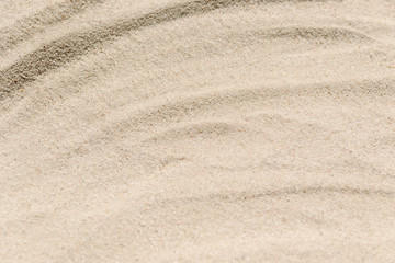 Fototapeta na wymiar Sand Texture. Brown sand. Background from fine sand. Sand background