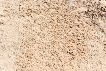 Sand Texture. Brown sand. Background from fine sand. Sand background