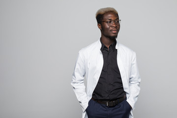 African Medical doctor man isolated on gray background