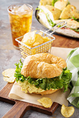 Egg salad sandwich on croissant