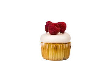 Vanilla Cupcake With Buttercream Icing And Raspberries. Isolated On White Background