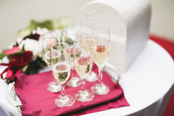 Luxury glasses with champagne on the table