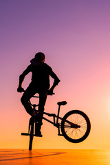 Fototapeta premium BMX rider at sunset