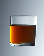 whisky liquor in clear glass drink
