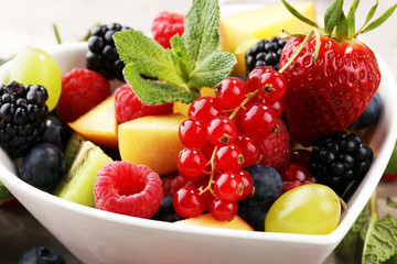 salad with fresh fruits and berries. healthy spring fruit salad