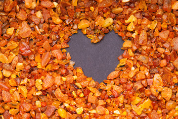 Amber stones and heart shape 