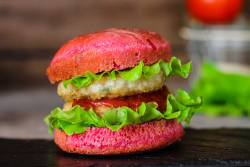 burgers pink (sandwiches) dough with beetroot juice. Beetroot buns burgers