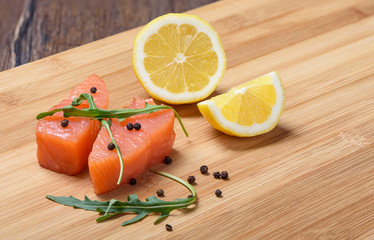 Slices of salmon on a cutting board