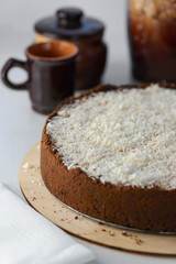 coconut cheesecake with a cup of tea