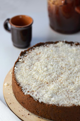 coconut cheesecake with a cup of tea