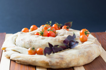 spiral filo pie burek with cherry tomatoes