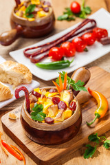 Dish with potatoes, cheese and vegetables