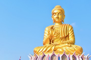 Golden Buddha Statue at Wat Samphran in Thailand