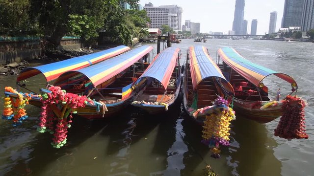 Longtail boat on river in Bangkok, Thailand.