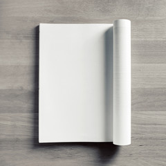 Blank opened magazine mock up. Catalog on wooden table background. Top view. Flat lay.