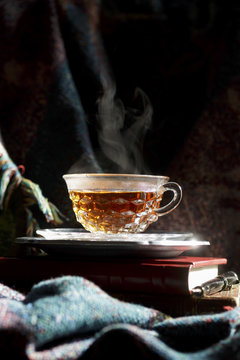 Rooibos tea in a clear cup and saucer