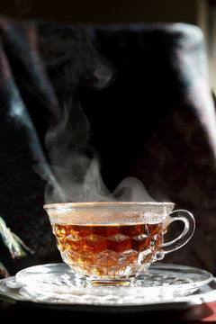 Rooibos tea in a clear cup and saucer