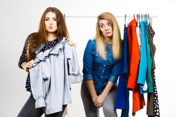 Women arguing during clothes shopping