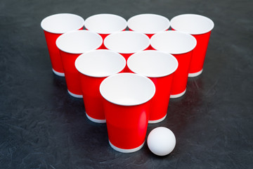 Beer pong. Popular game at parties. Place for your text.