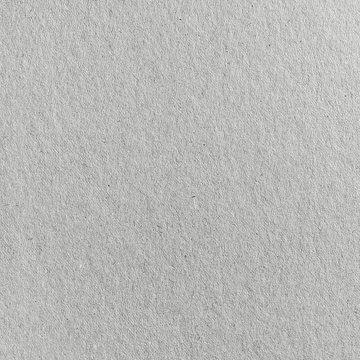 Blank gray paper texture. Textured paper background or wallpaper. Top view. Flat lay.