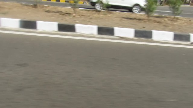 Different colors lines drawn on the road having gap indicates line changing is allowed.