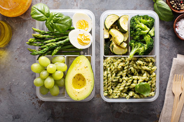 Vegetarian meal prep containers with pasta and vegetables