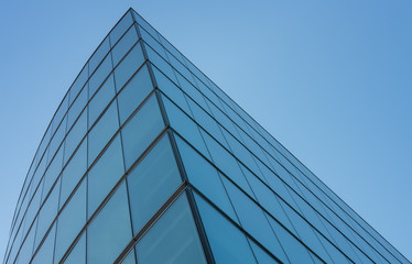Fototapeta na wymiar Glass facade, modern architecture with blue sky, morning shoot