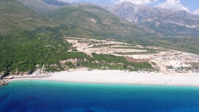 Waves crashing on a beach in Albania