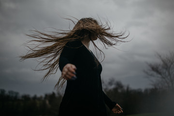 Woman With Long Hair Blowing in the Wind