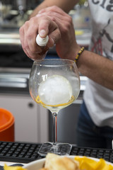 spraying aroma into a cocktail