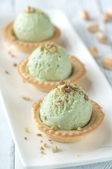 Pistachio ice cream in the pastry shells