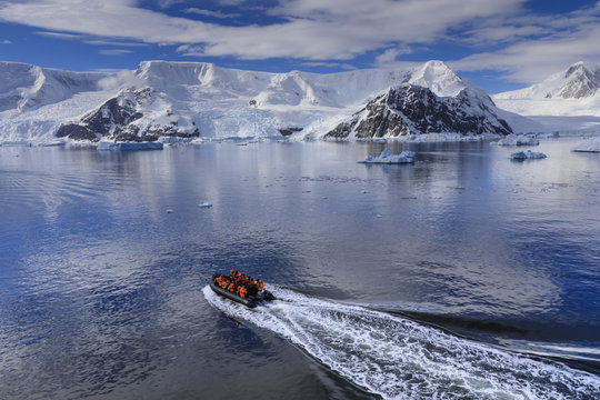 Early morning on a gorgeous day, elevated view of zodiac boat in Neko Harbour, Andvord Bay, Antarctic Continent, Antarctica
