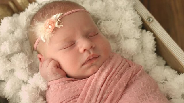 Close-up of a sleeping newborn girl