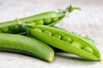 Pods of fresh green peas